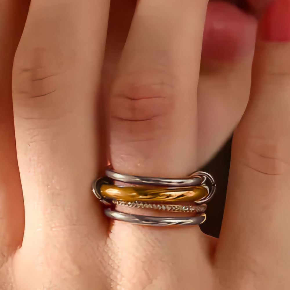 Gold and Silver Multi-Band Ring with Interlocking Design